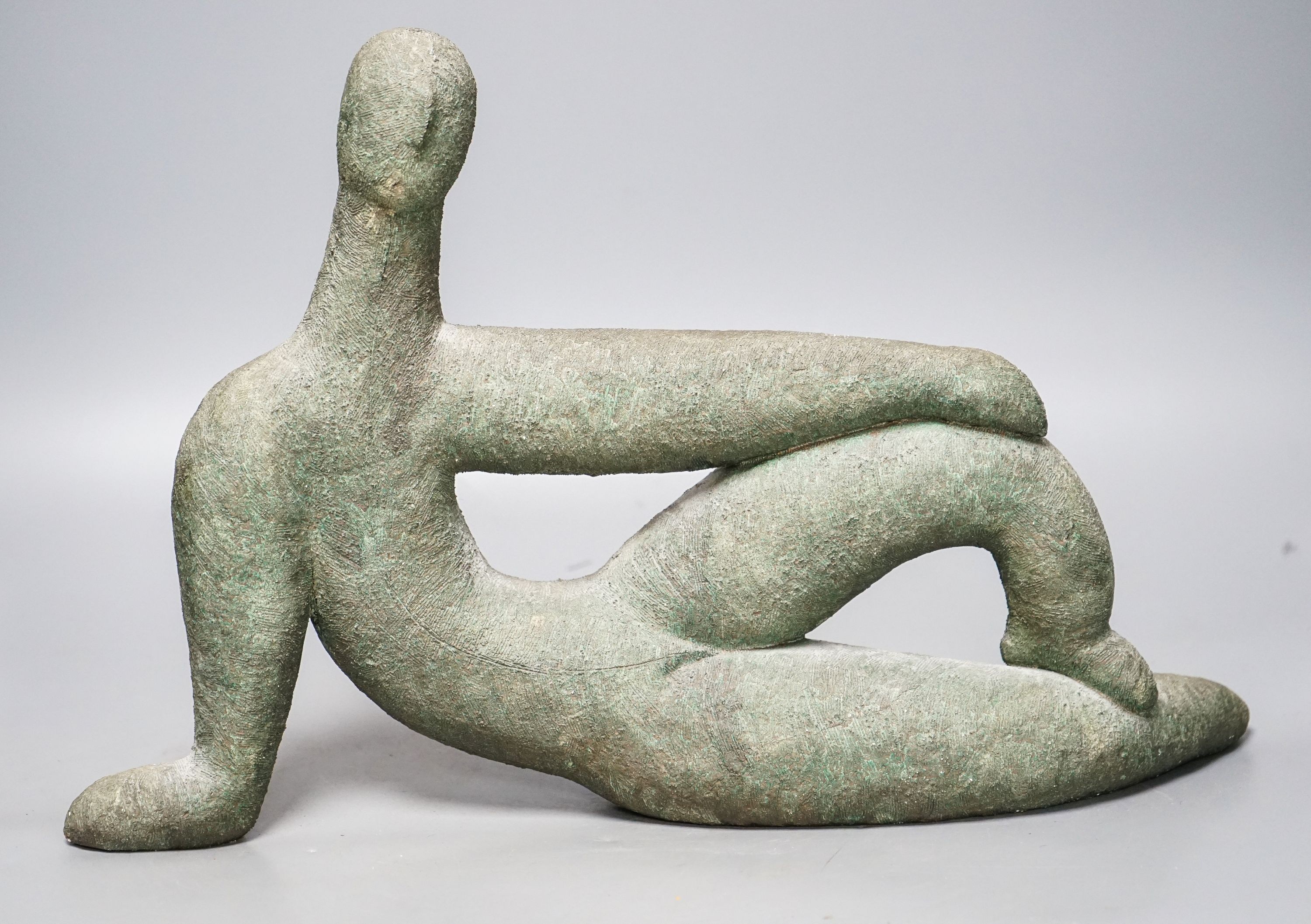 A bronzed pottery abstract figure, marked ‘WP 92’ 40cm